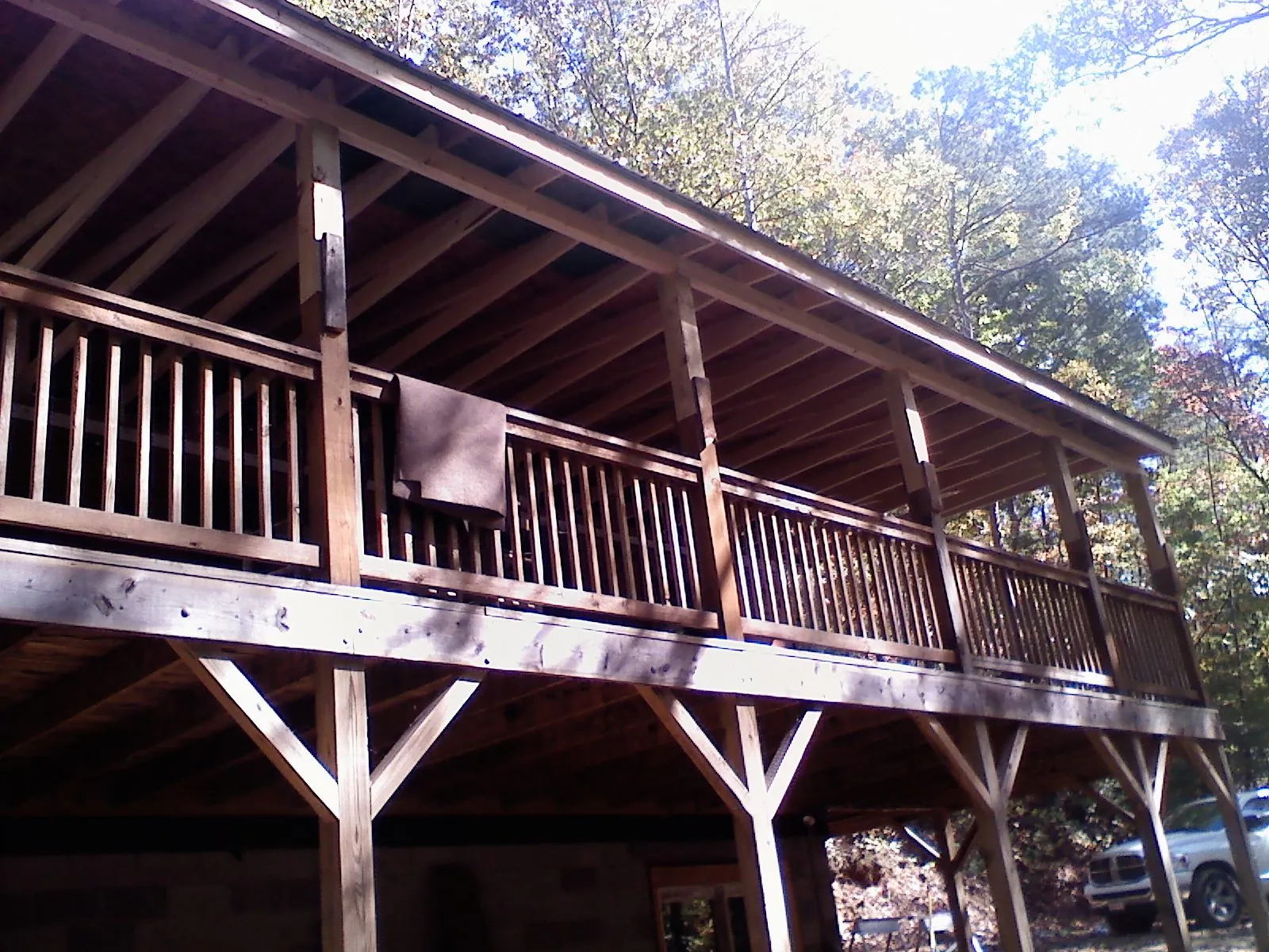Timber framing under a new elevated porch and deck — Roof Leak Repair in Ackley by Roofing Brothers